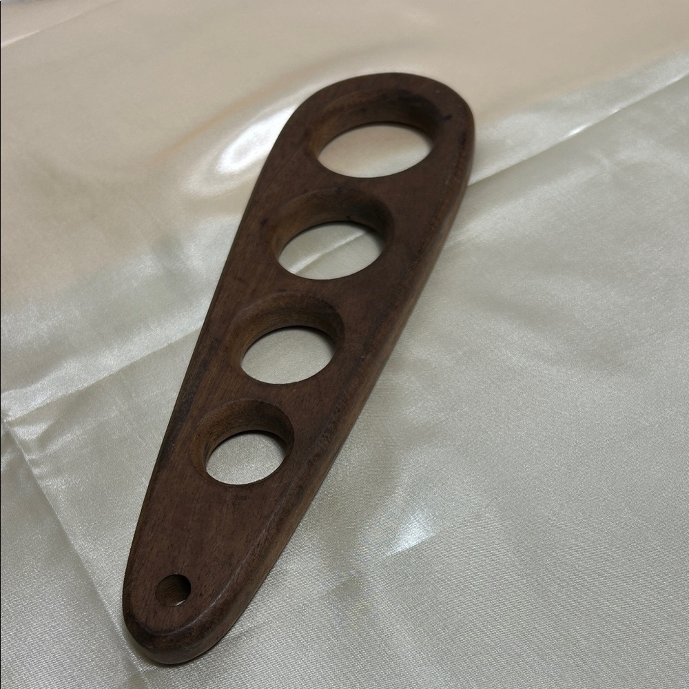 Vintage wooden spaghetti measuring tool
